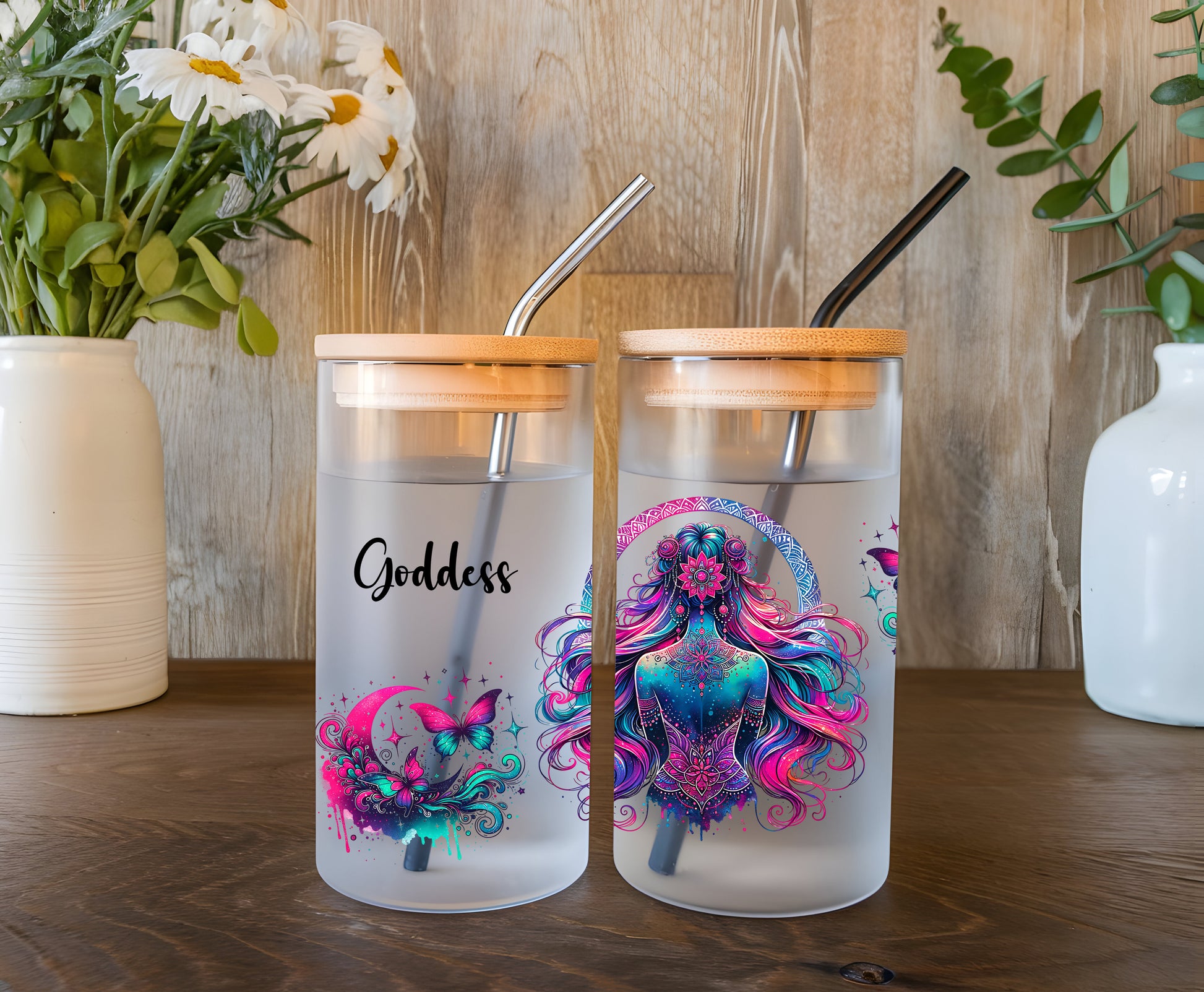 a couple of cups sitting on top of a wooden table