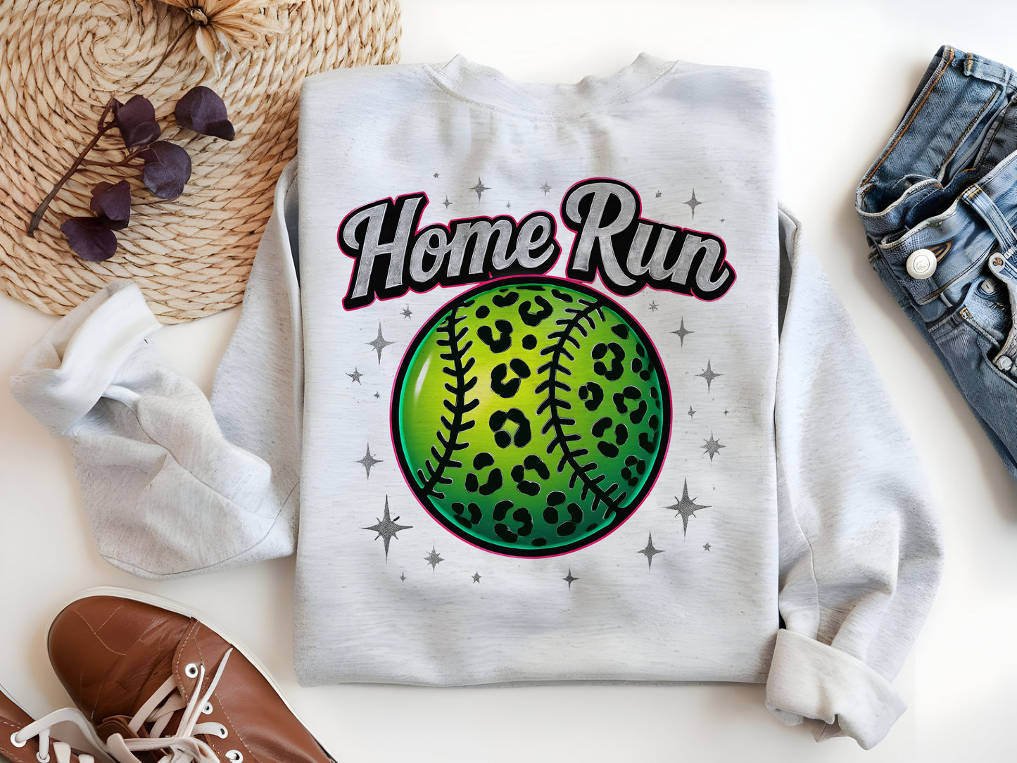 a white sweatshirt with a green baseball on it