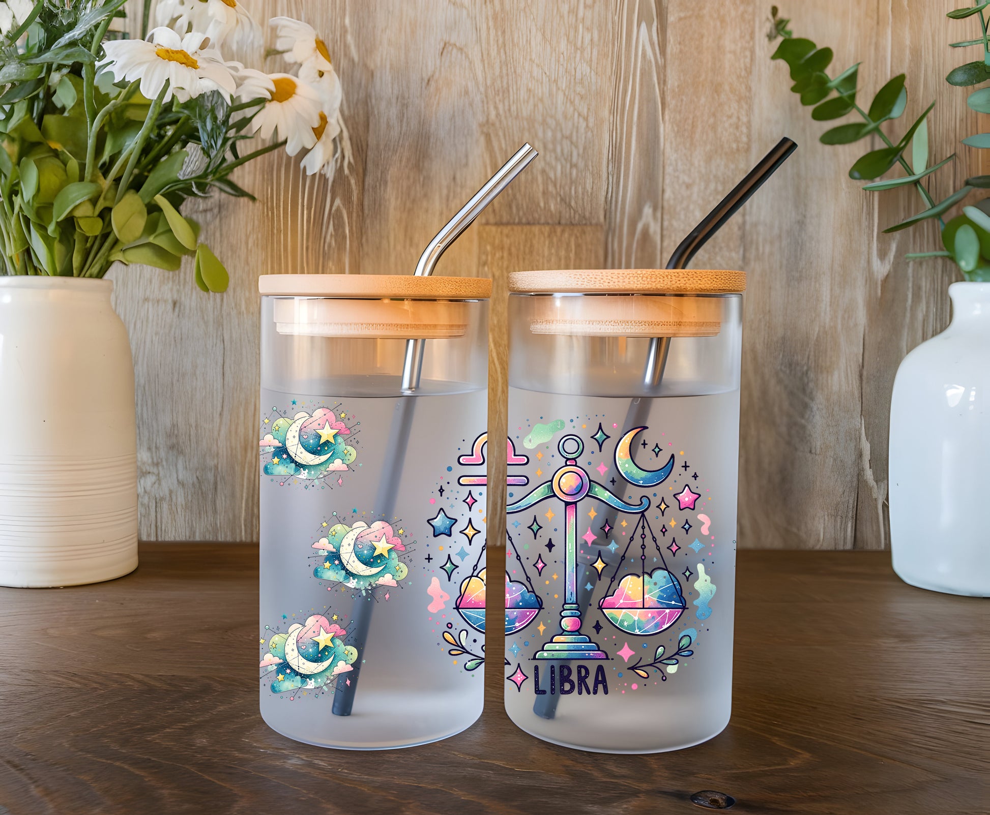 a couple of cups sitting on top of a wooden table