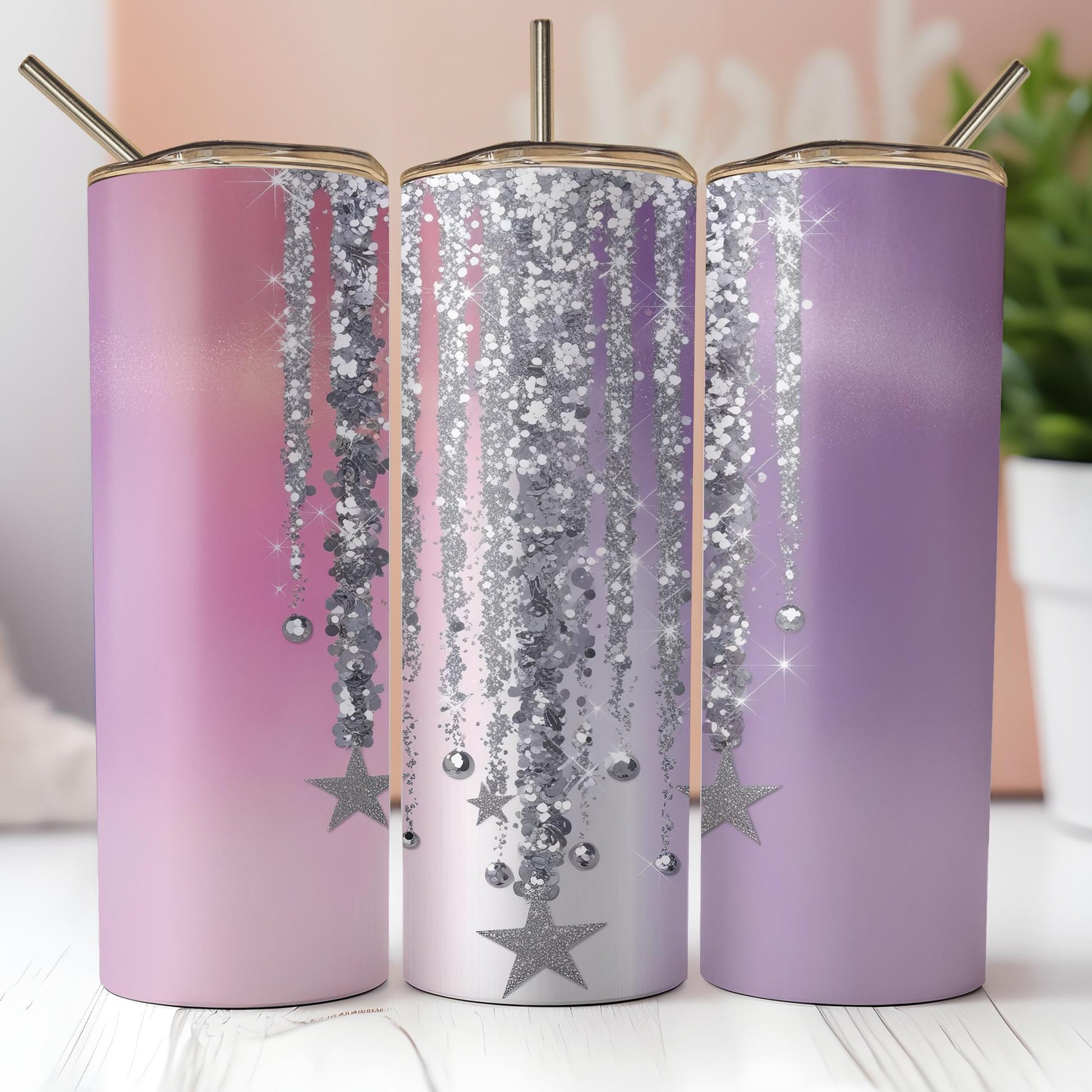 a couple of pink and purple tumbles sitting on top of a table