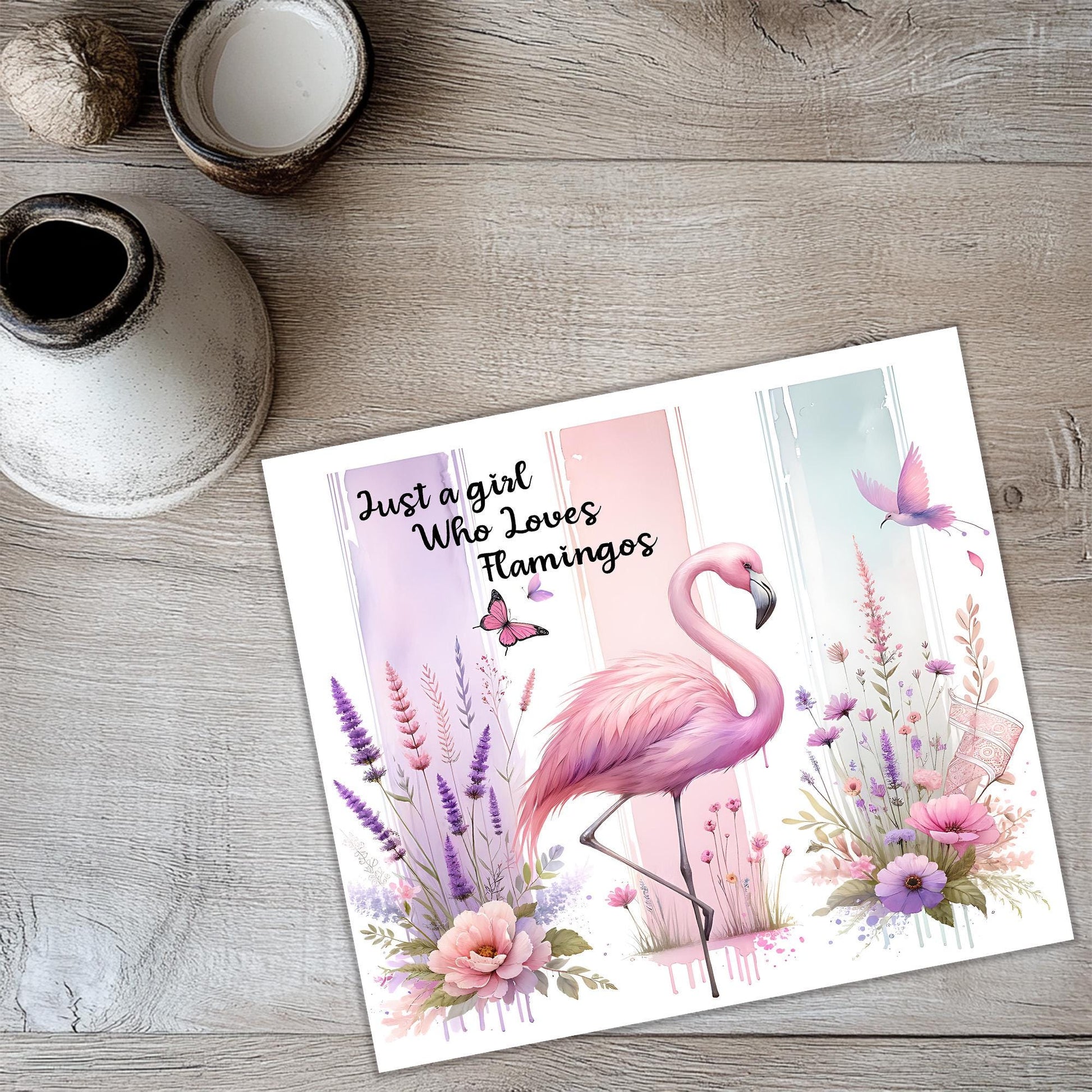 a card with a picture of a pink flamingo