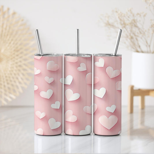 a couple of pink cups with hearts on them
