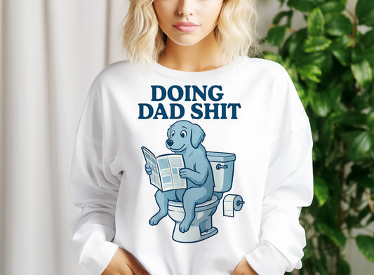 a woman wearing a white shirt with a blue dog on it