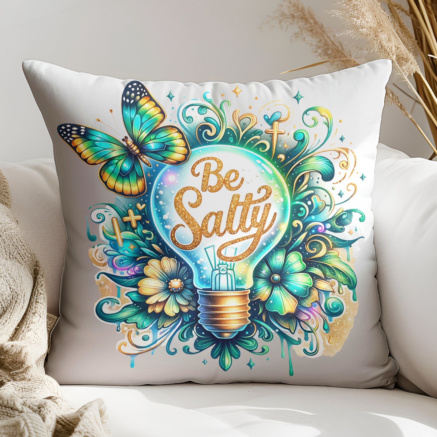 a decorative pillow with a light bulb and butterflies on it