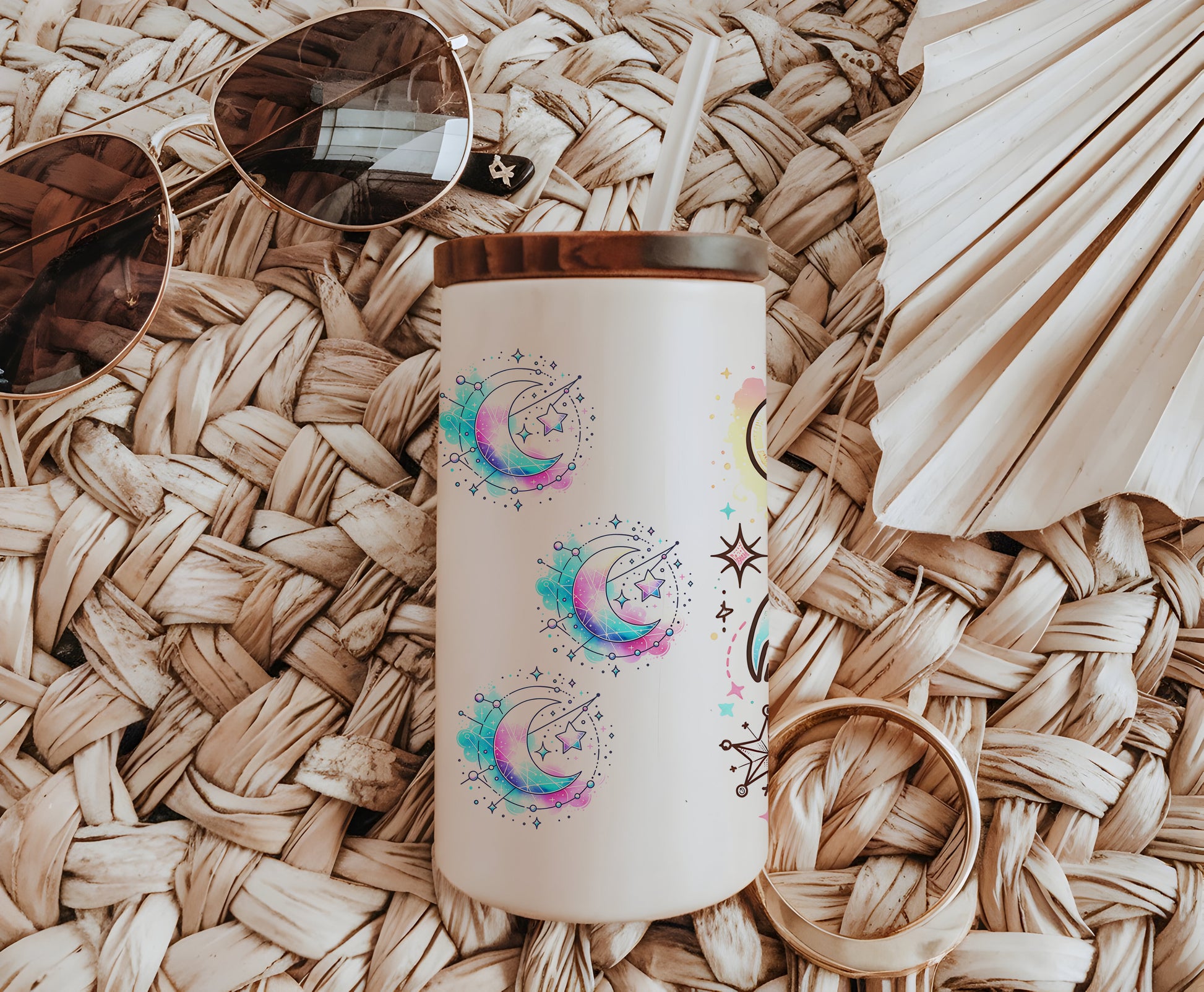 a white coffee cup sitting on top of a wicker table