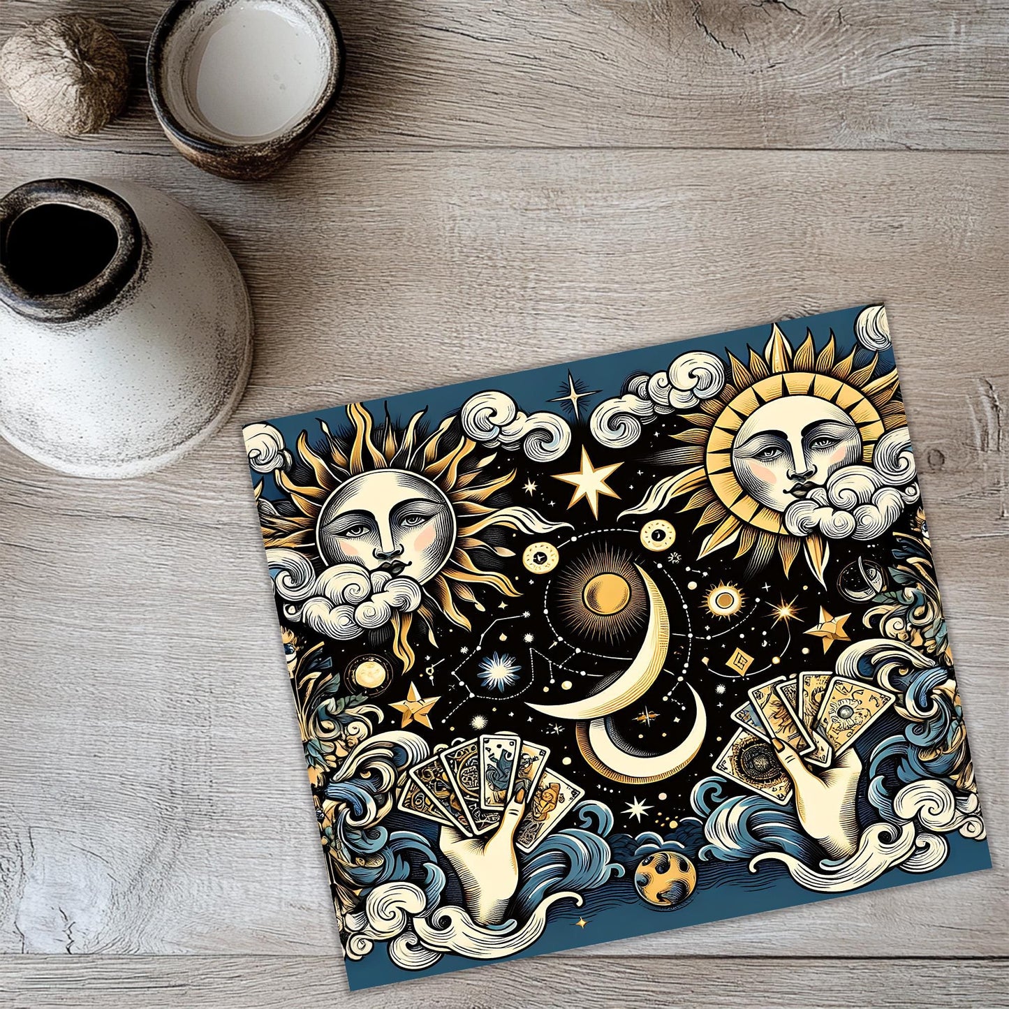 a picture of a sun and moon on a table
