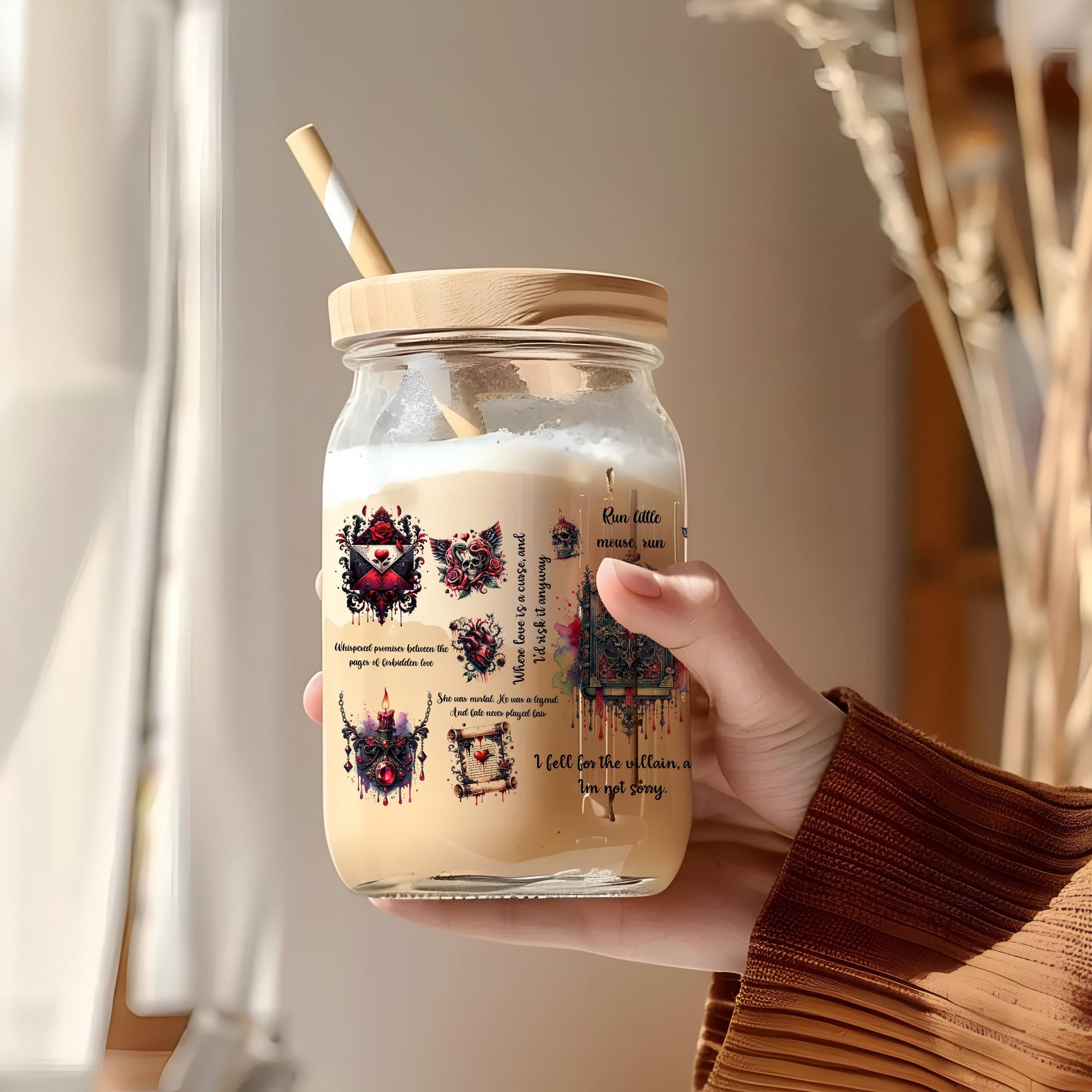 a person holding a jar with a straw in it