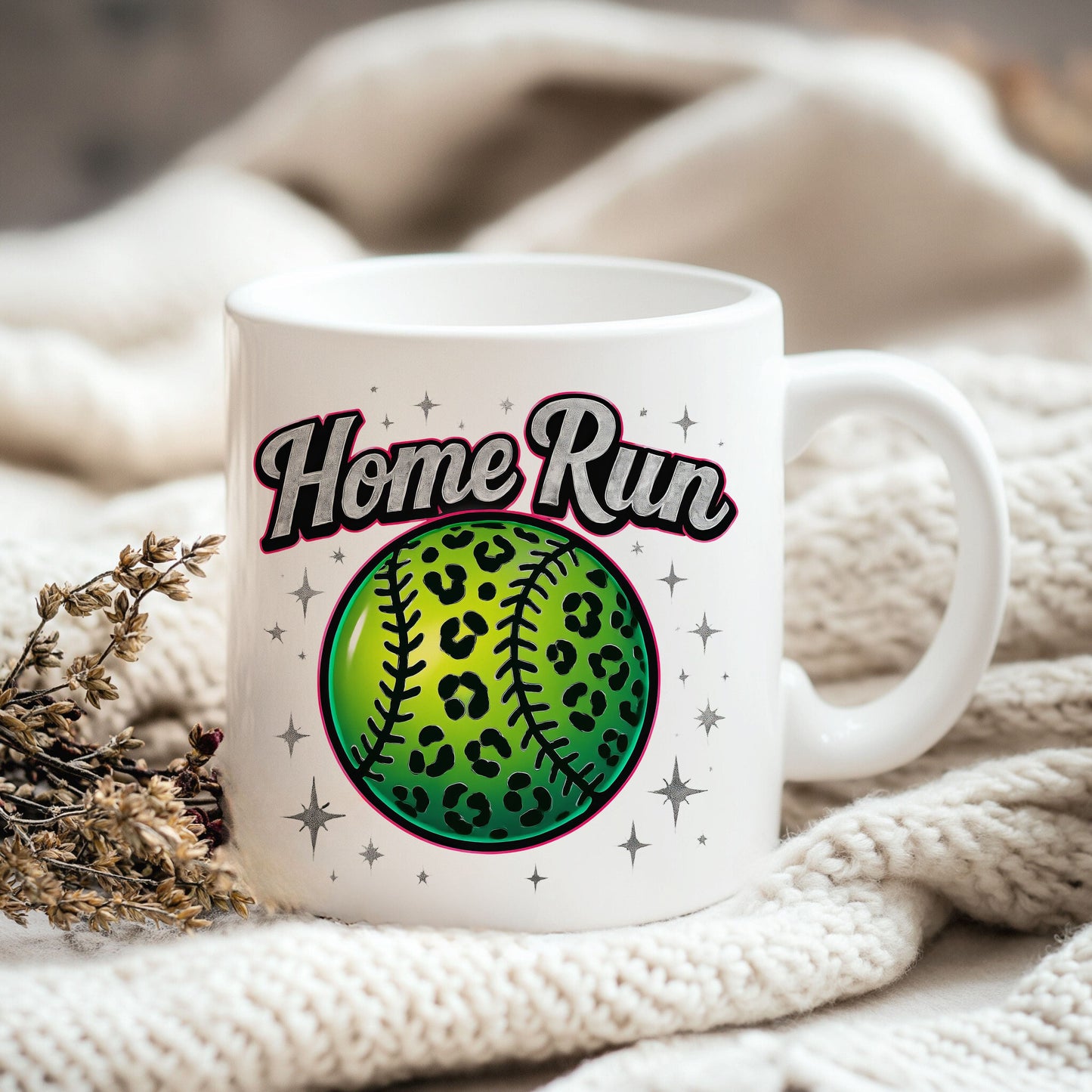 a white coffee mug with a baseball on it