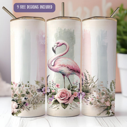 three pink flamingos with flowers on them on a table