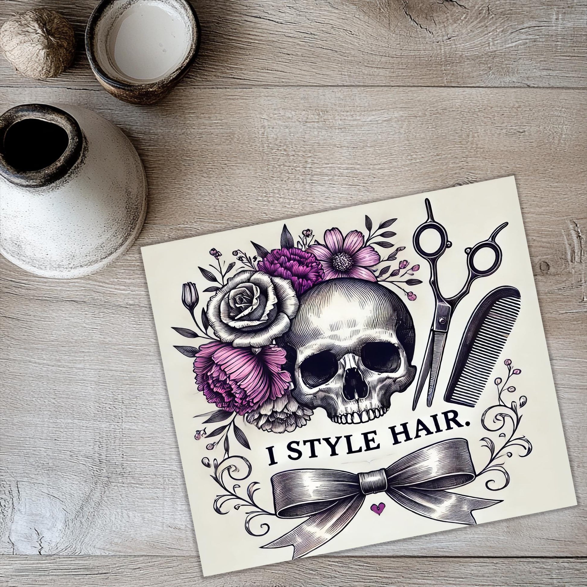 a card with a skull and flowers on it