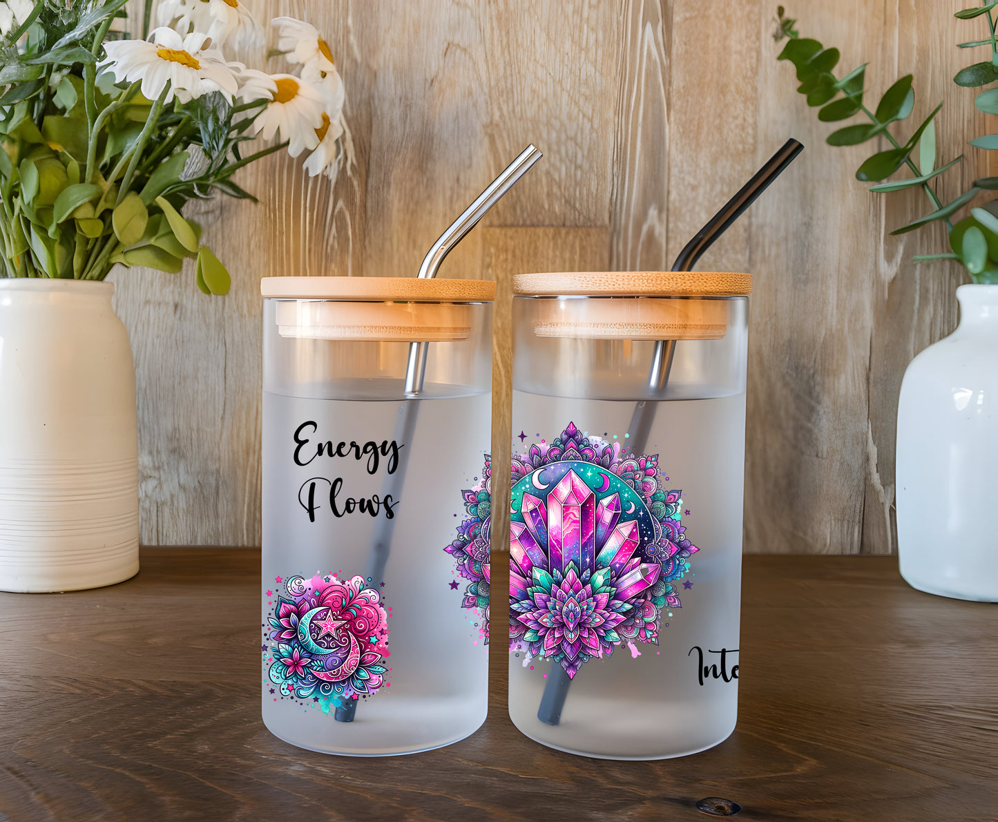 a couple of cups sitting on top of a wooden table