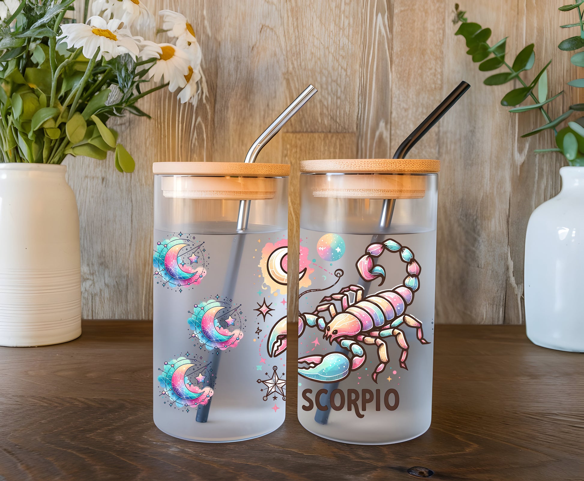 a couple of cups sitting on top of a wooden table