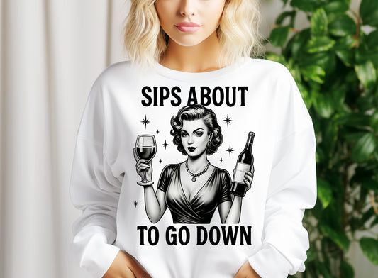 a woman holding a glass of wine and a bottle of wine