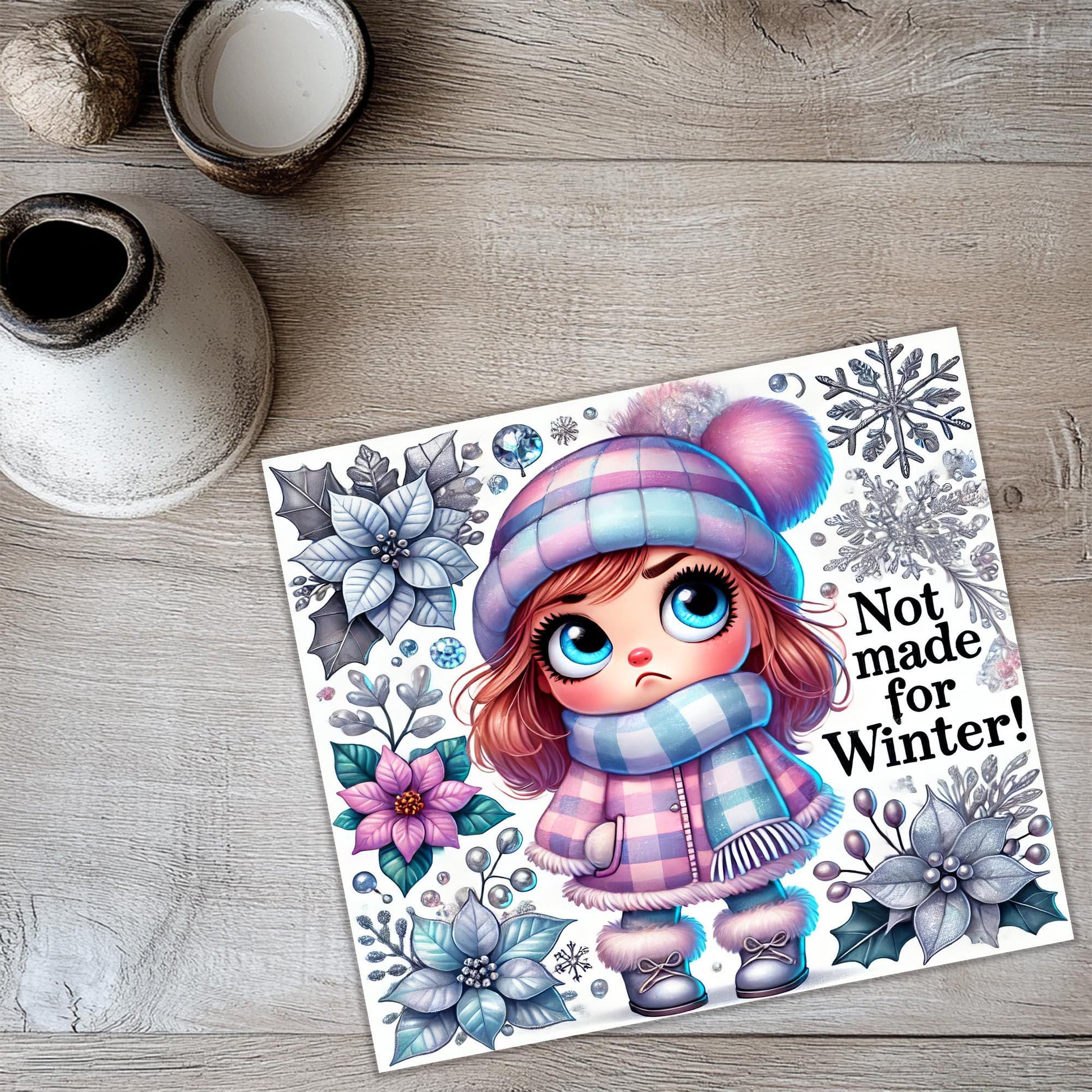 a card with a picture of a girl wearing a hat and scarf