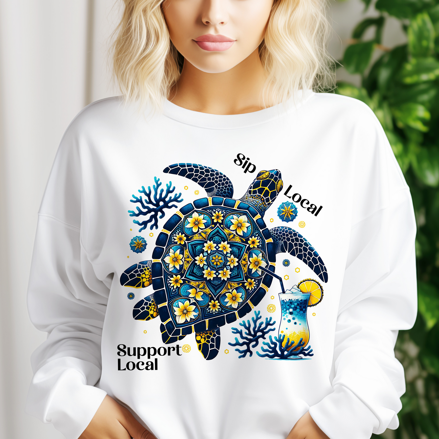 a woman wearing a white shirt with a turtle on it