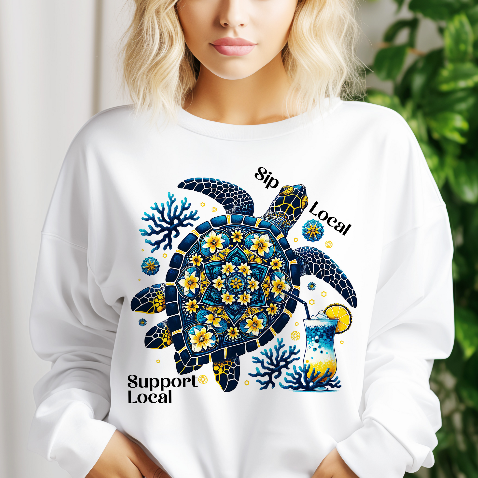 a woman wearing a white shirt with a turtle on it