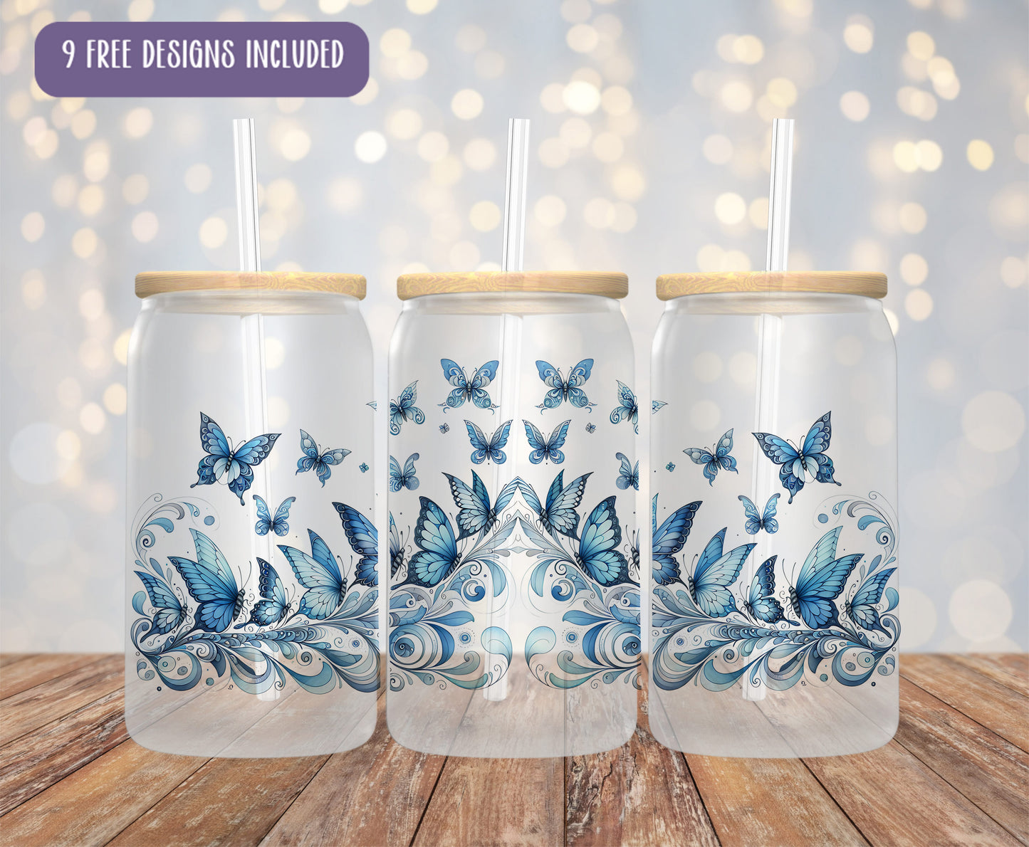 three glass jars with blue butterflies painted on them