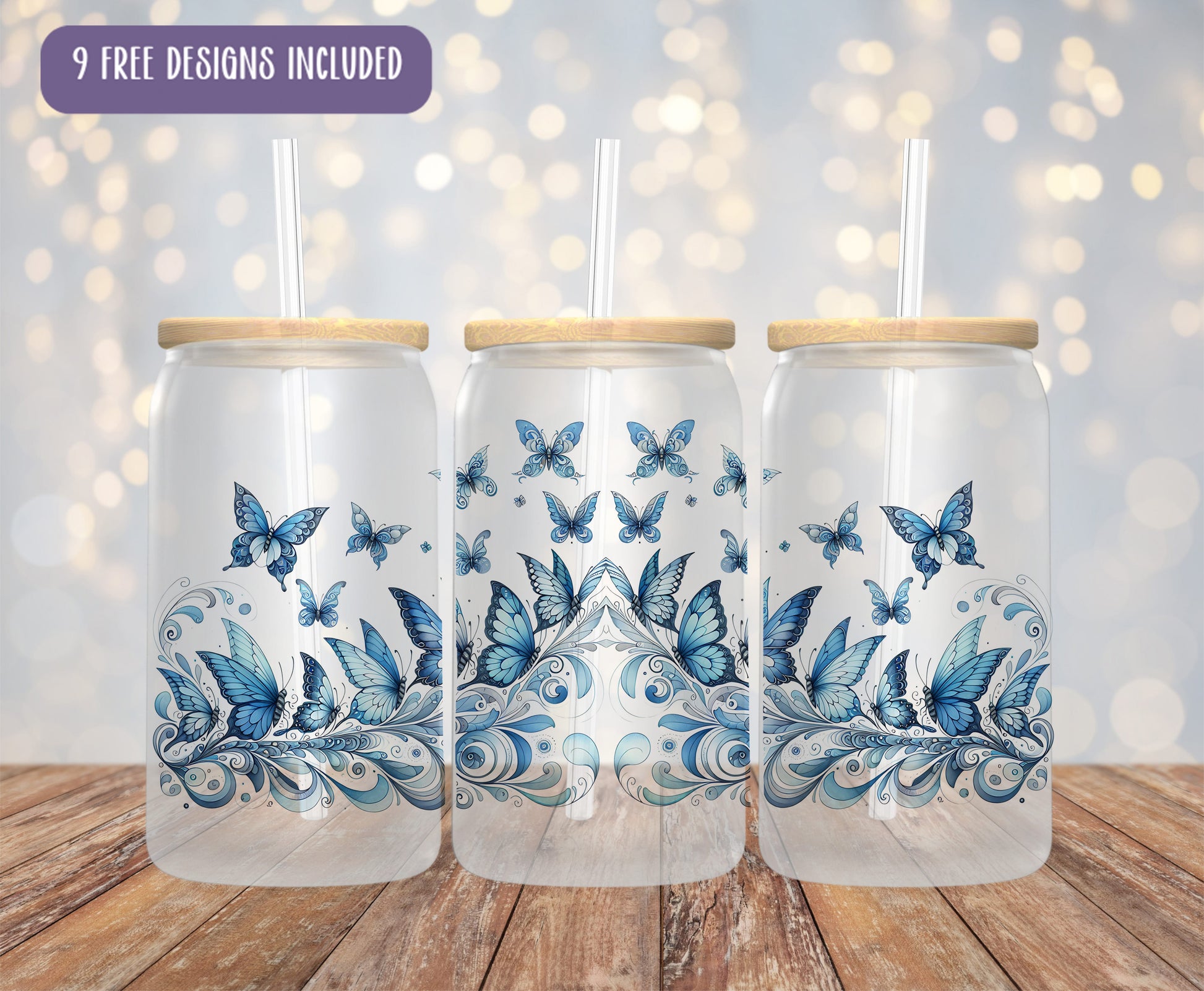 three glass jars with blue butterflies painted on them