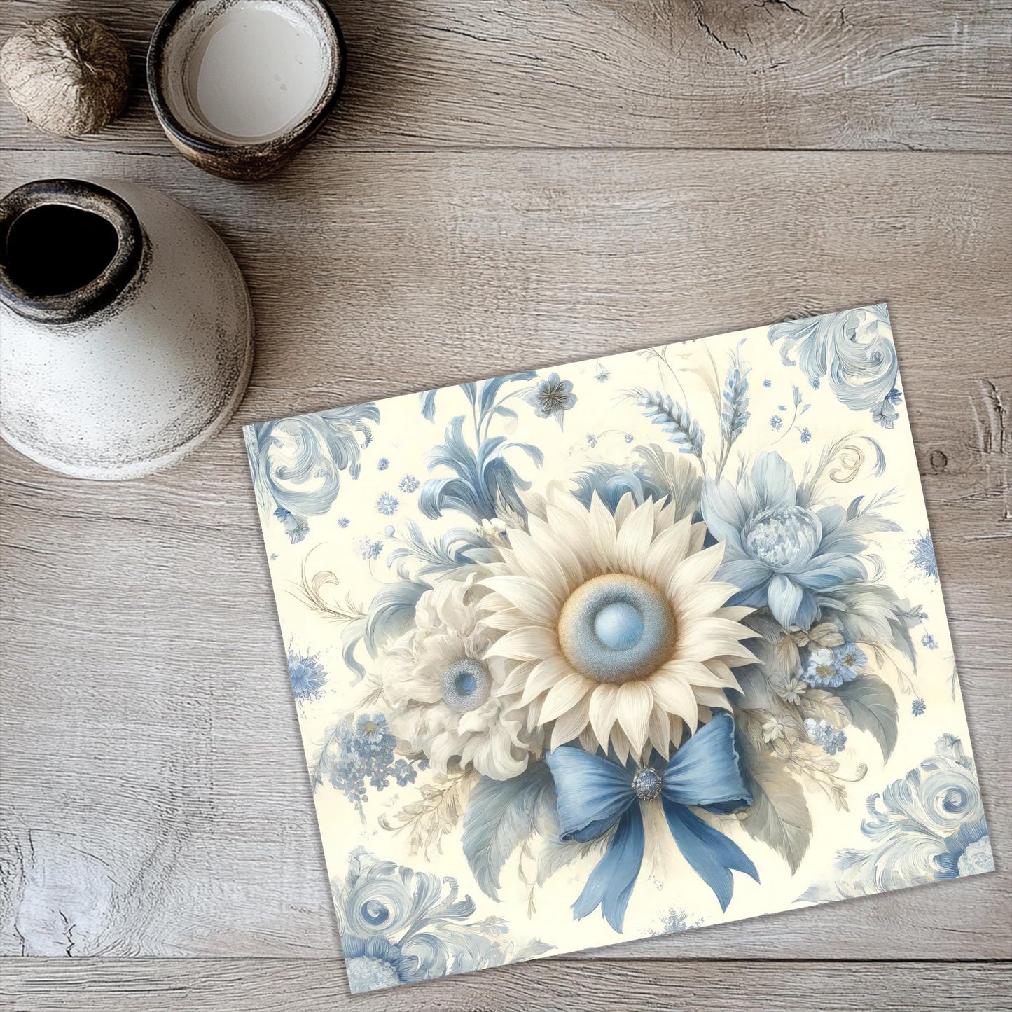 a picture of a flower on a wooden floor