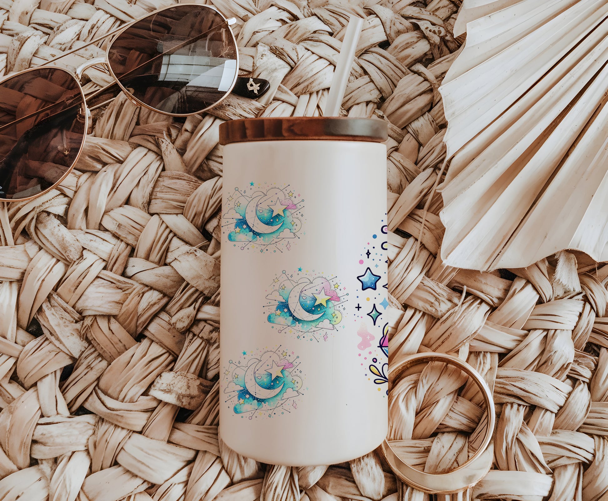 a white coffee cup sitting on top of a wicker table