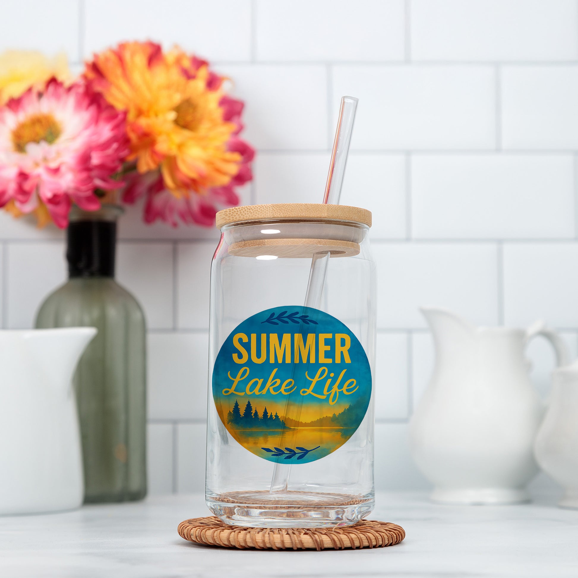 a glass jar with a straw in it sitting on a counter