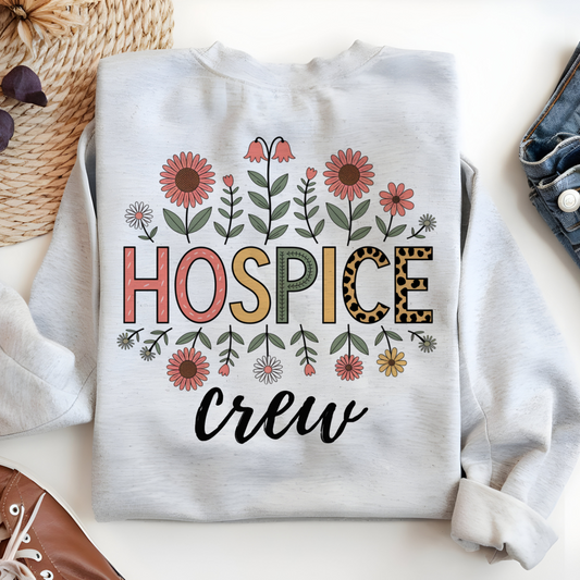 a white sweatshirt with the words hospice crew printed on it