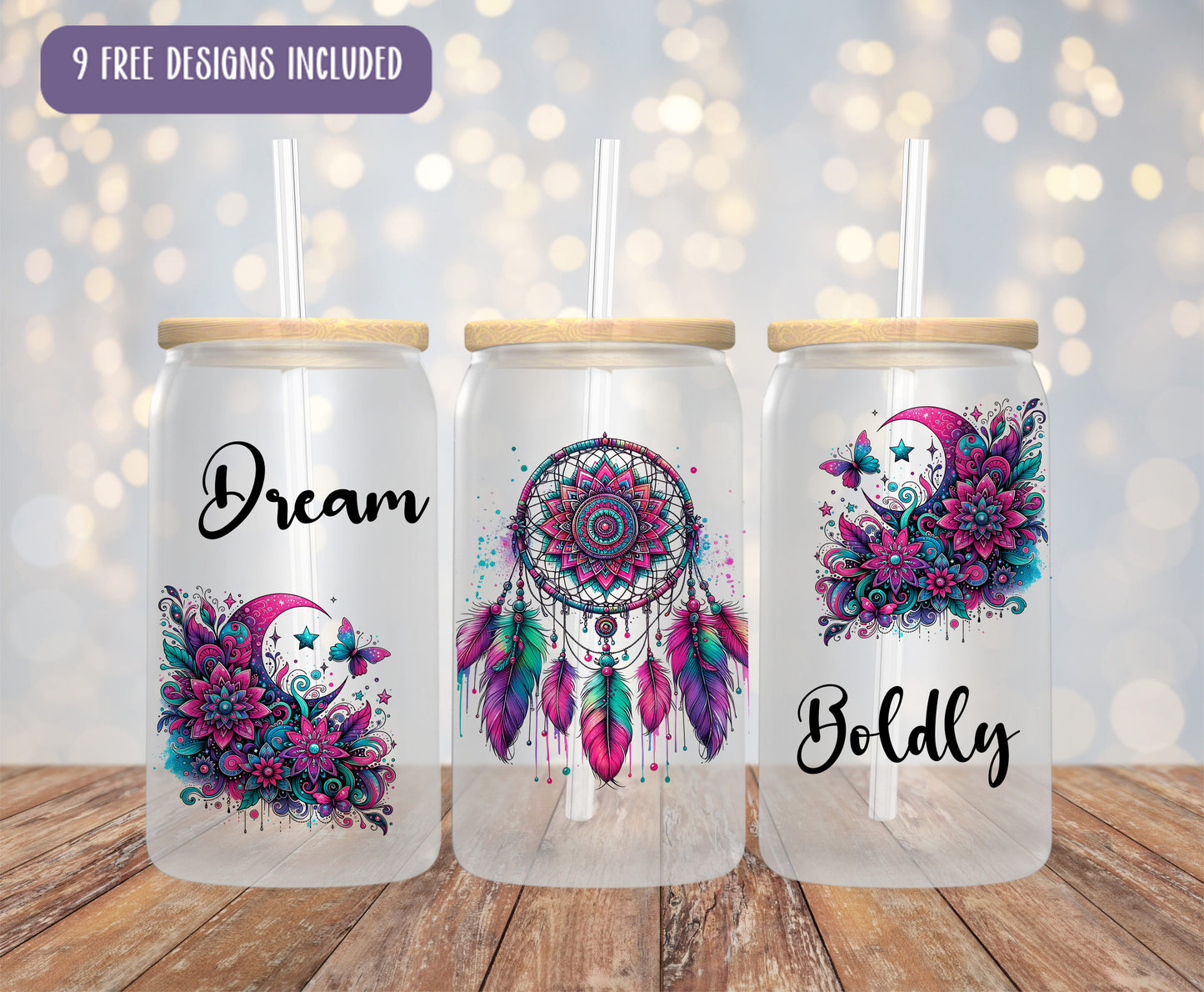 three mason jars with designs on them on a wooden table