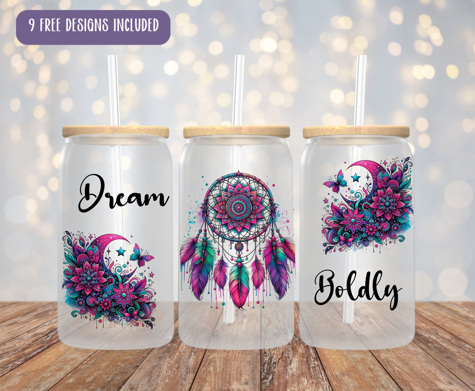 three mason jars with designs on them on a wooden table