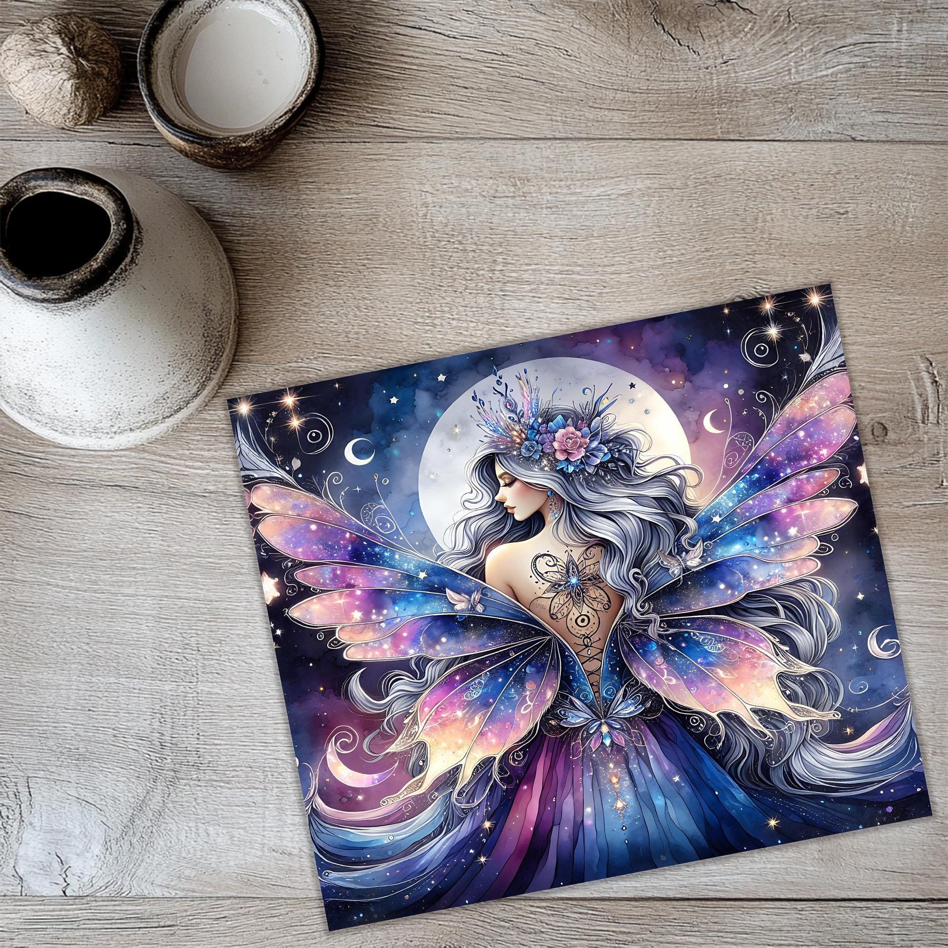 a painting of a fairy sitting on top of a table