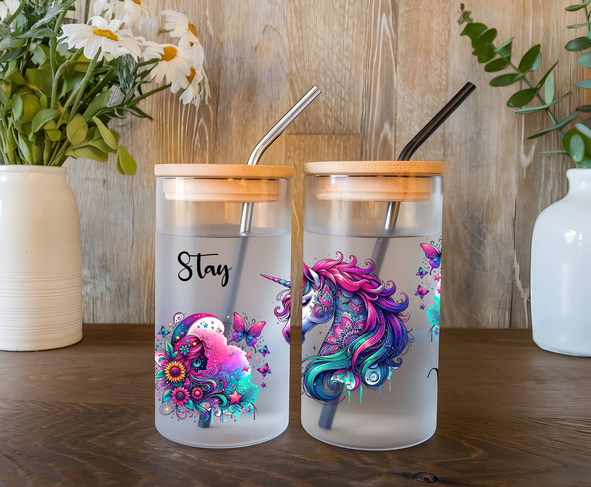 a couple of cups sitting on top of a wooden table