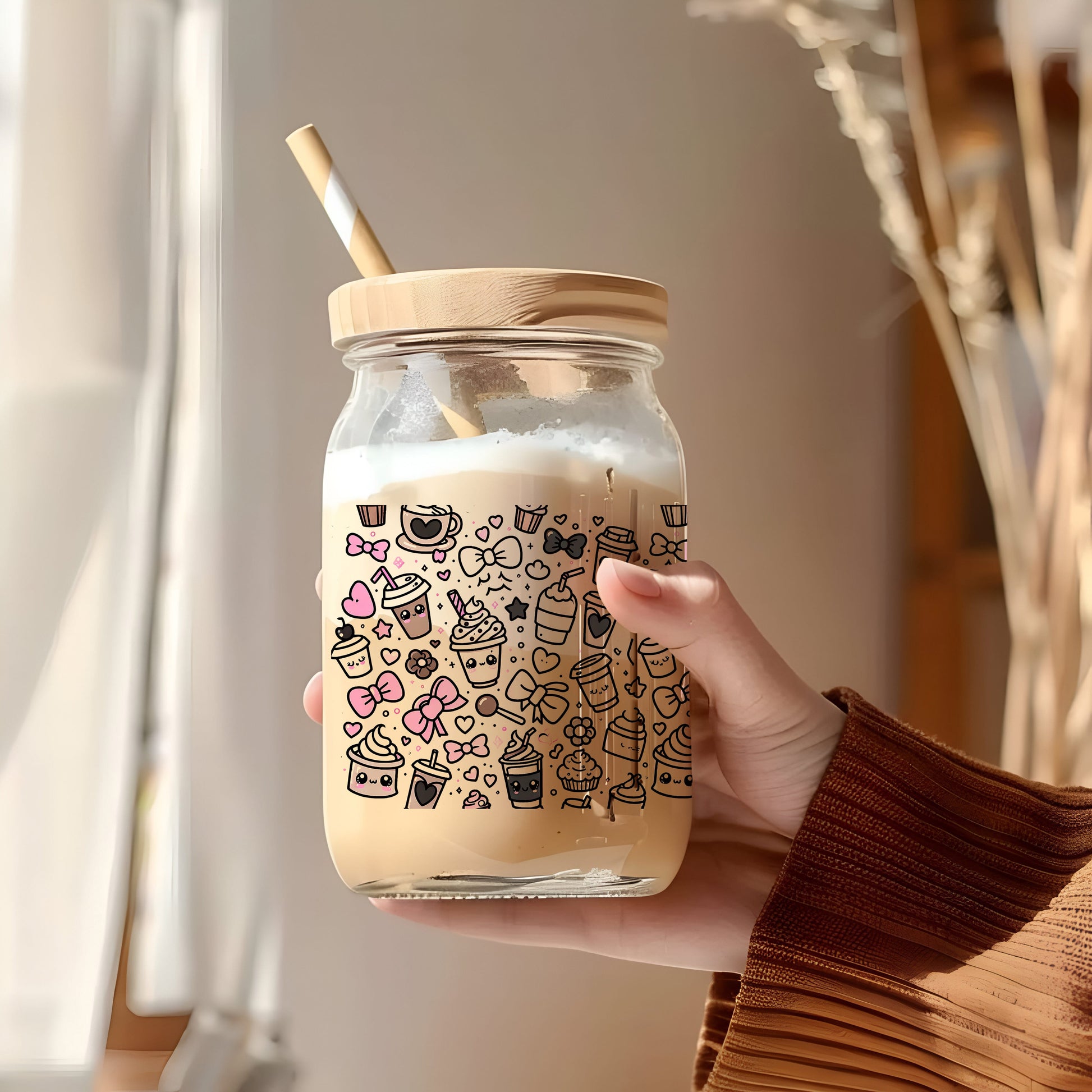 a person holding a jar with a straw in it