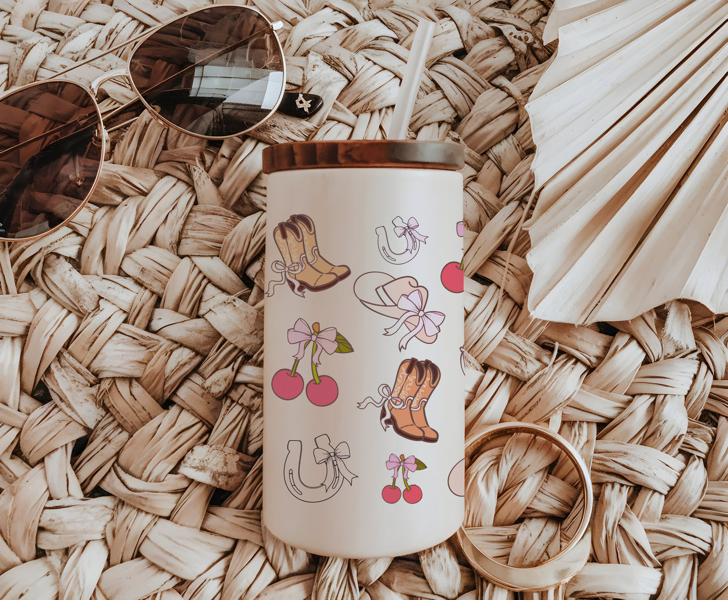a coffee cup with sunglasses on top of a wicker mat