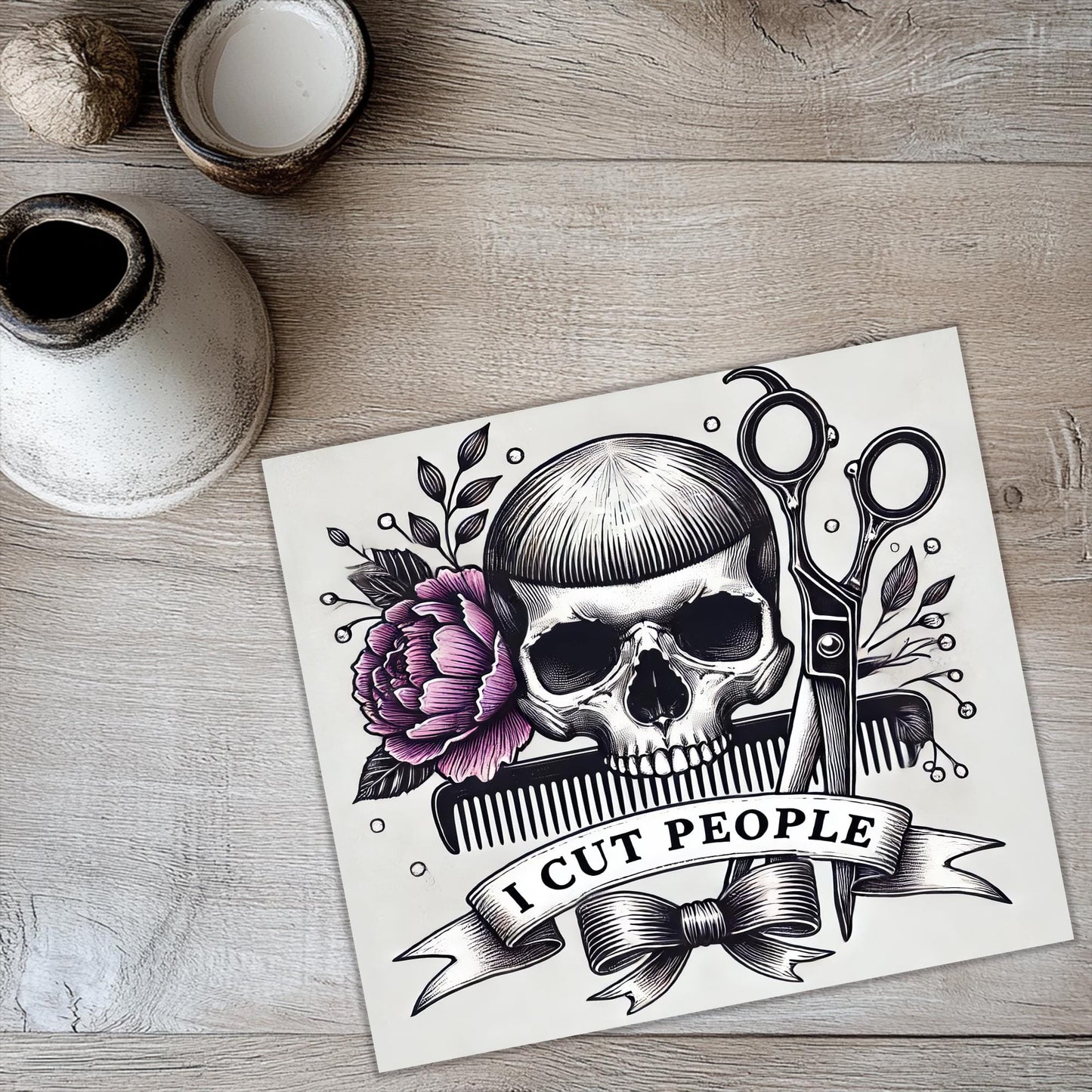 a picture of a skull with scissors and a ribbon