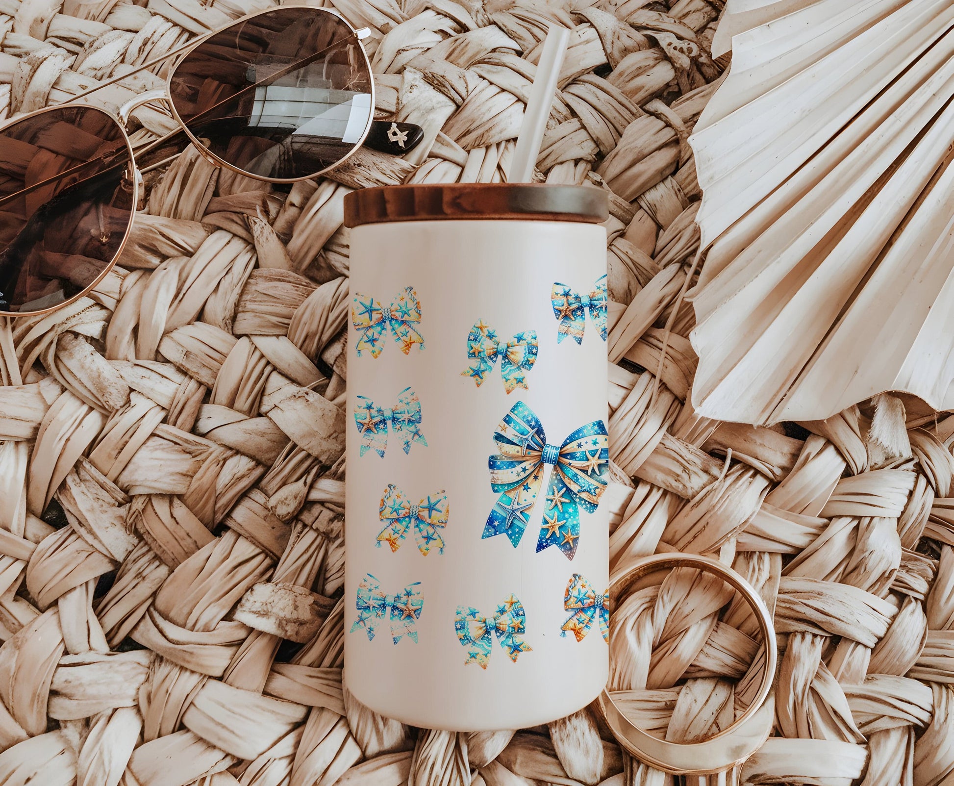 a white coffee mug with a blue bow on it