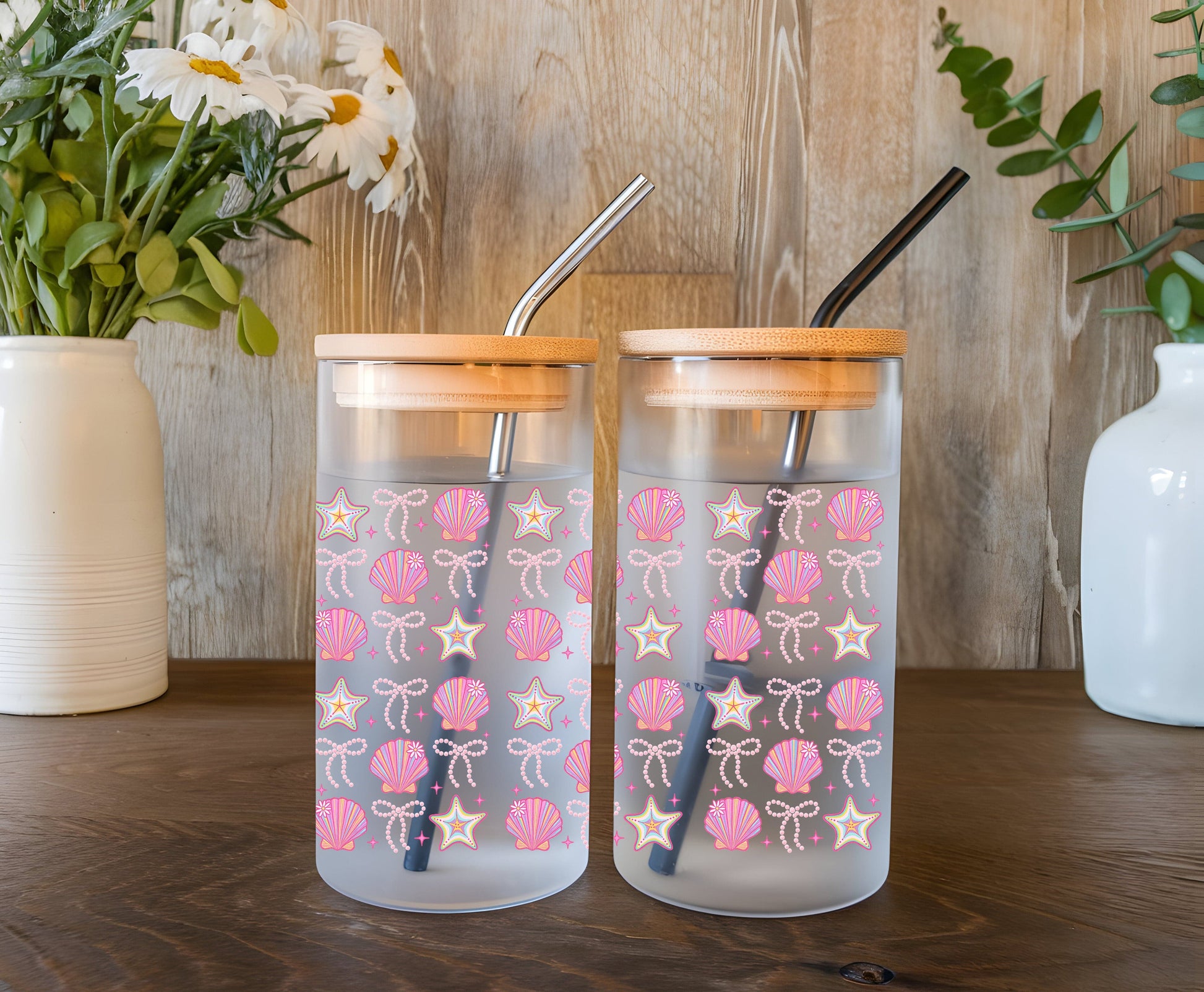 a couple of cups sitting on top of a wooden table