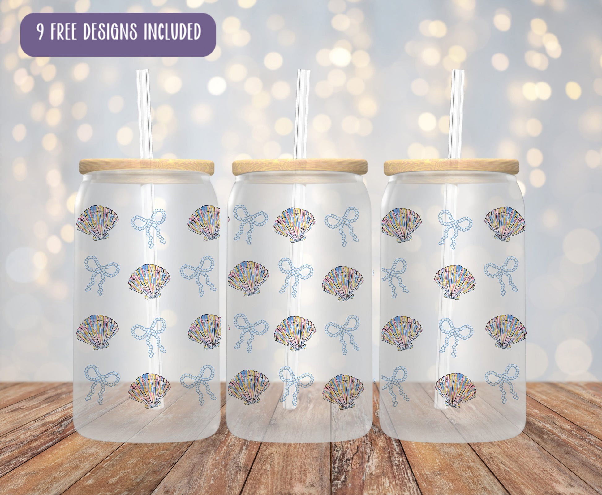 a set of three glass tumblers with designs on them