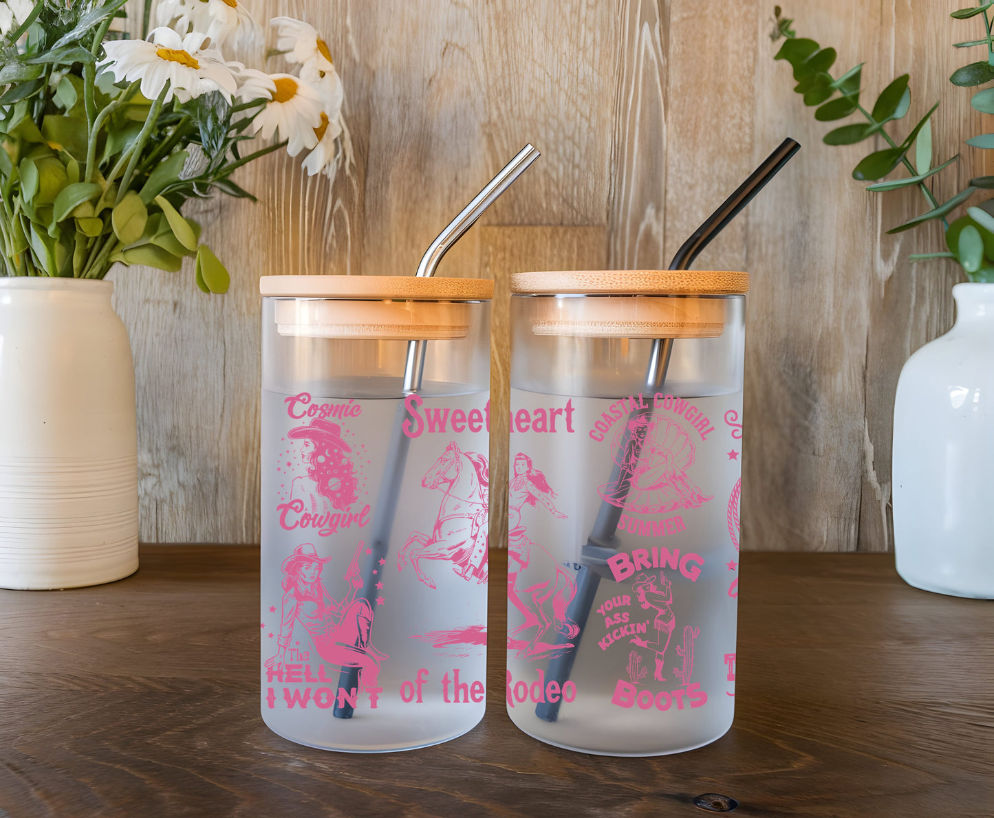 a couple of cups sitting on top of a wooden table