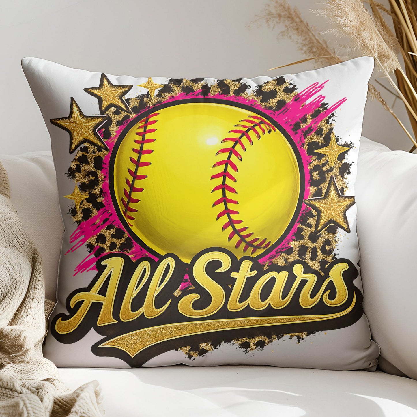 a pillow with a softball on it on a couch