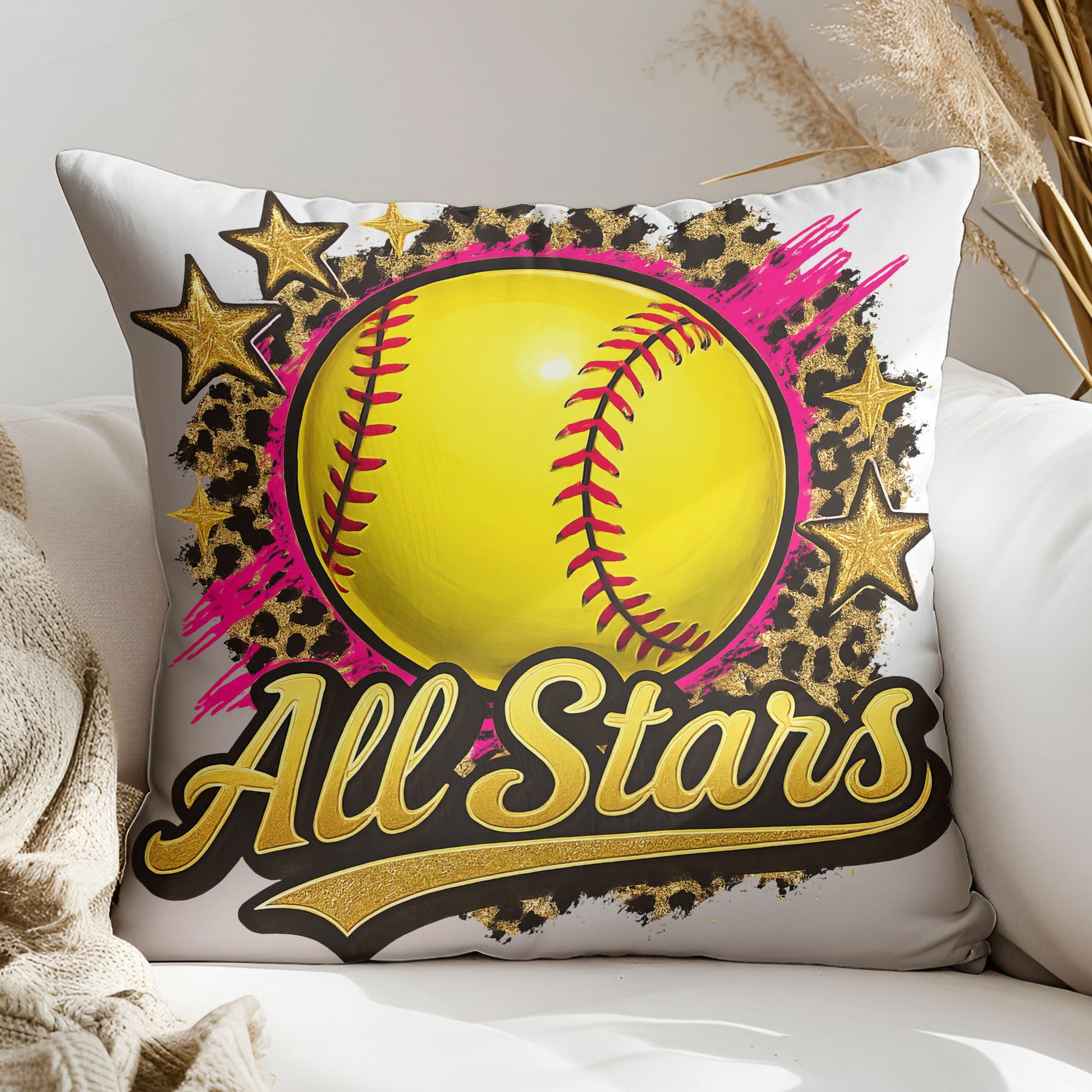 a pillow with a softball on it on a couch