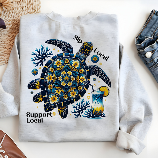 a white shirt with an image of a turtle on it