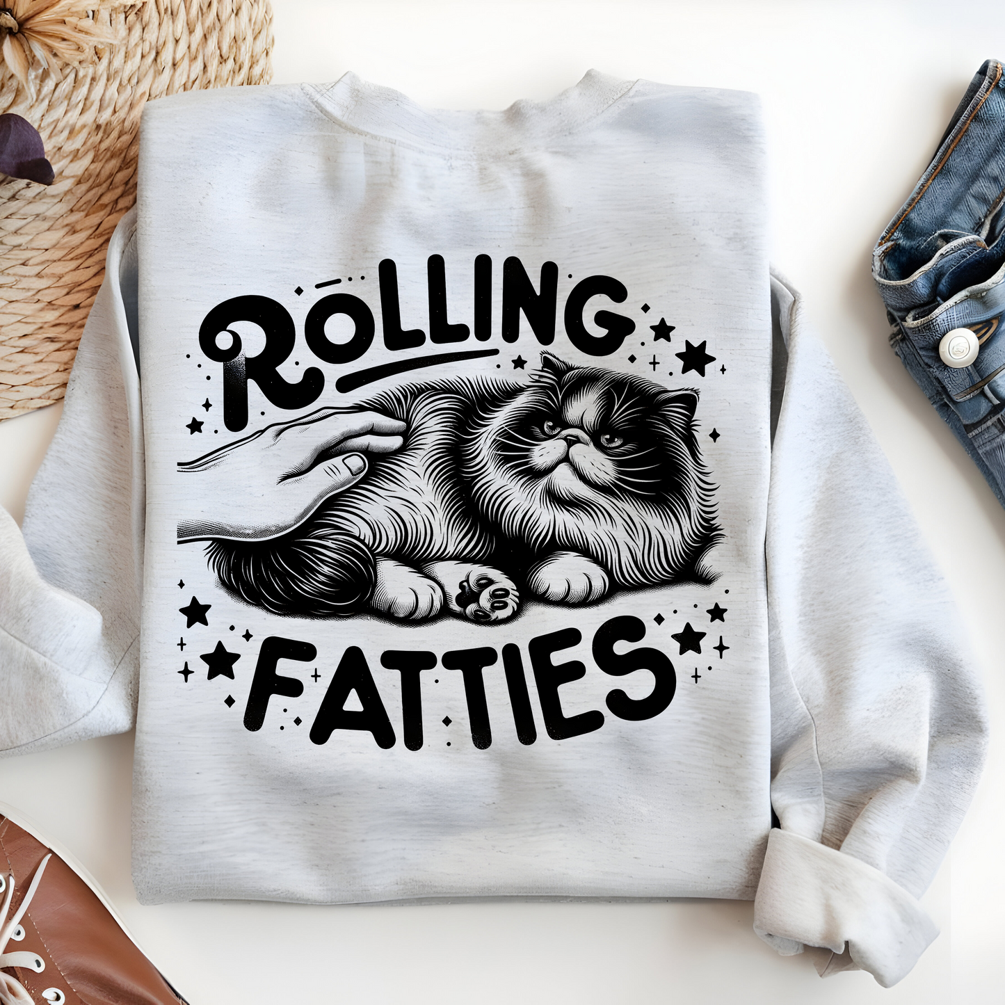 a white shirt with a black cat on it