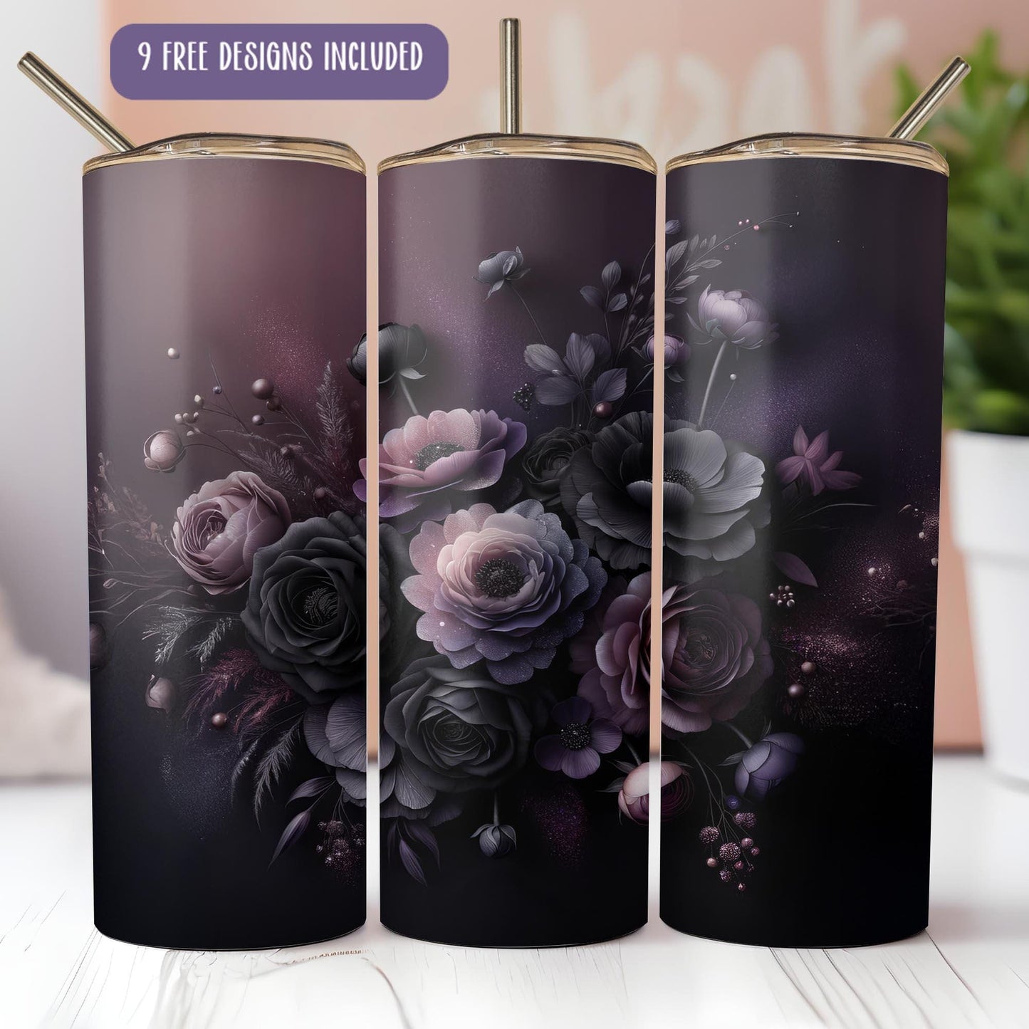 a set of three black and purple floral tumblers