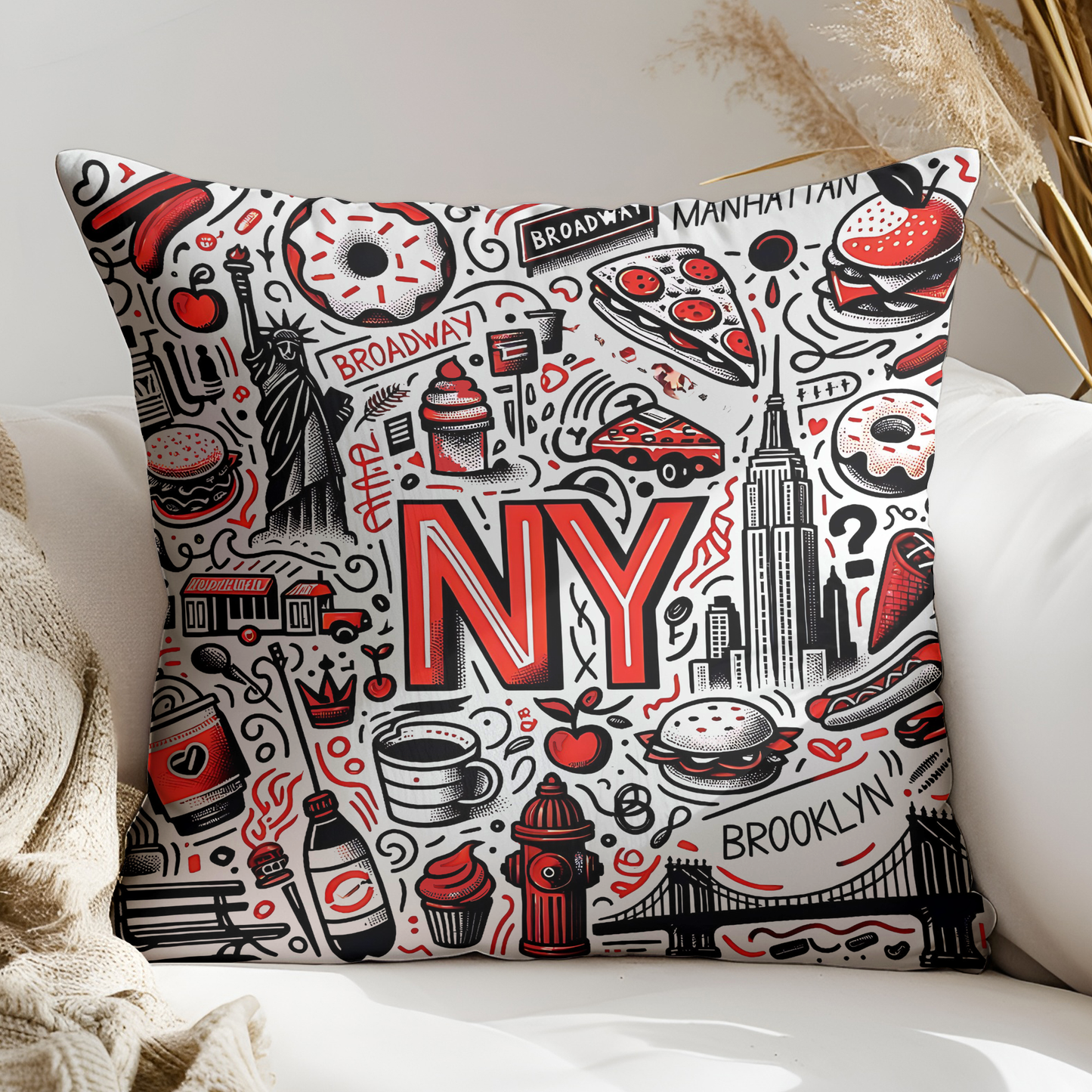 A decorative throw pillow with various New York-themed illustrations, including the Statue of Liberty, Broadway, Manhattan, and other iconic landmarks and symbols.