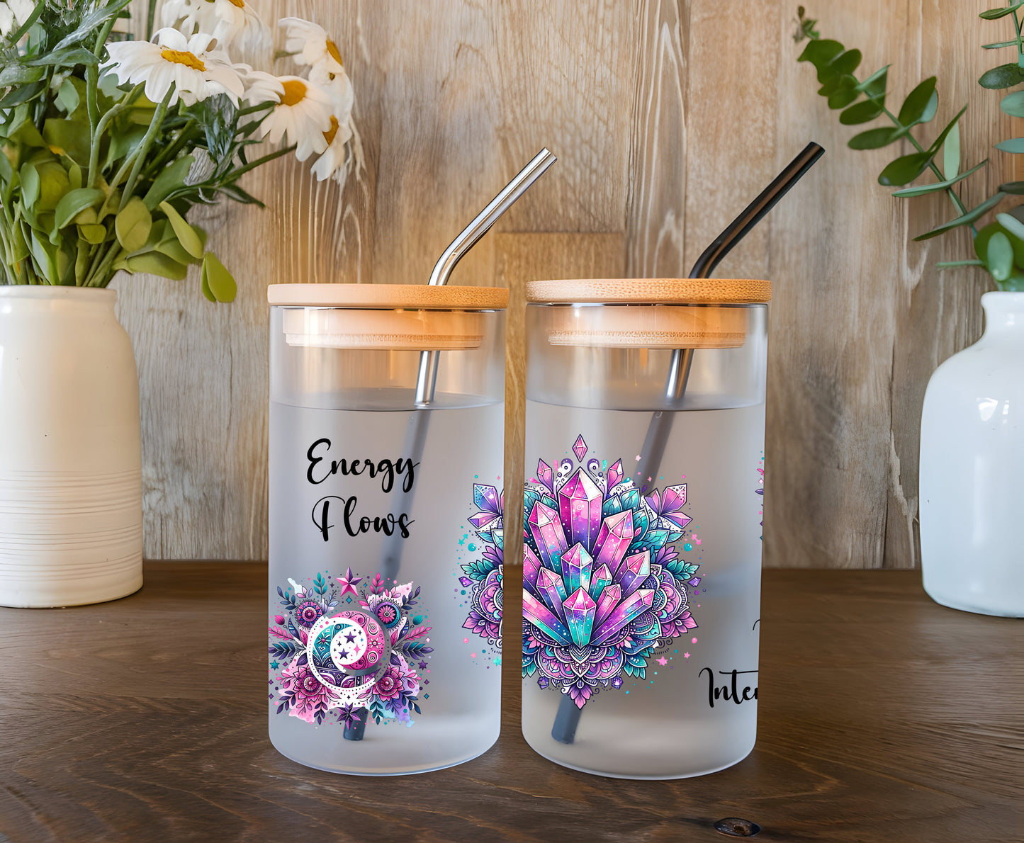 a couple of cups sitting on top of a wooden table