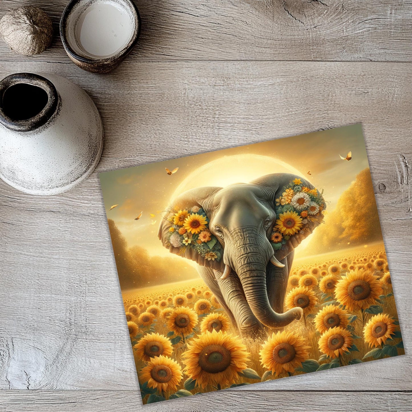 a picture of an elephant with sunflowers on it
