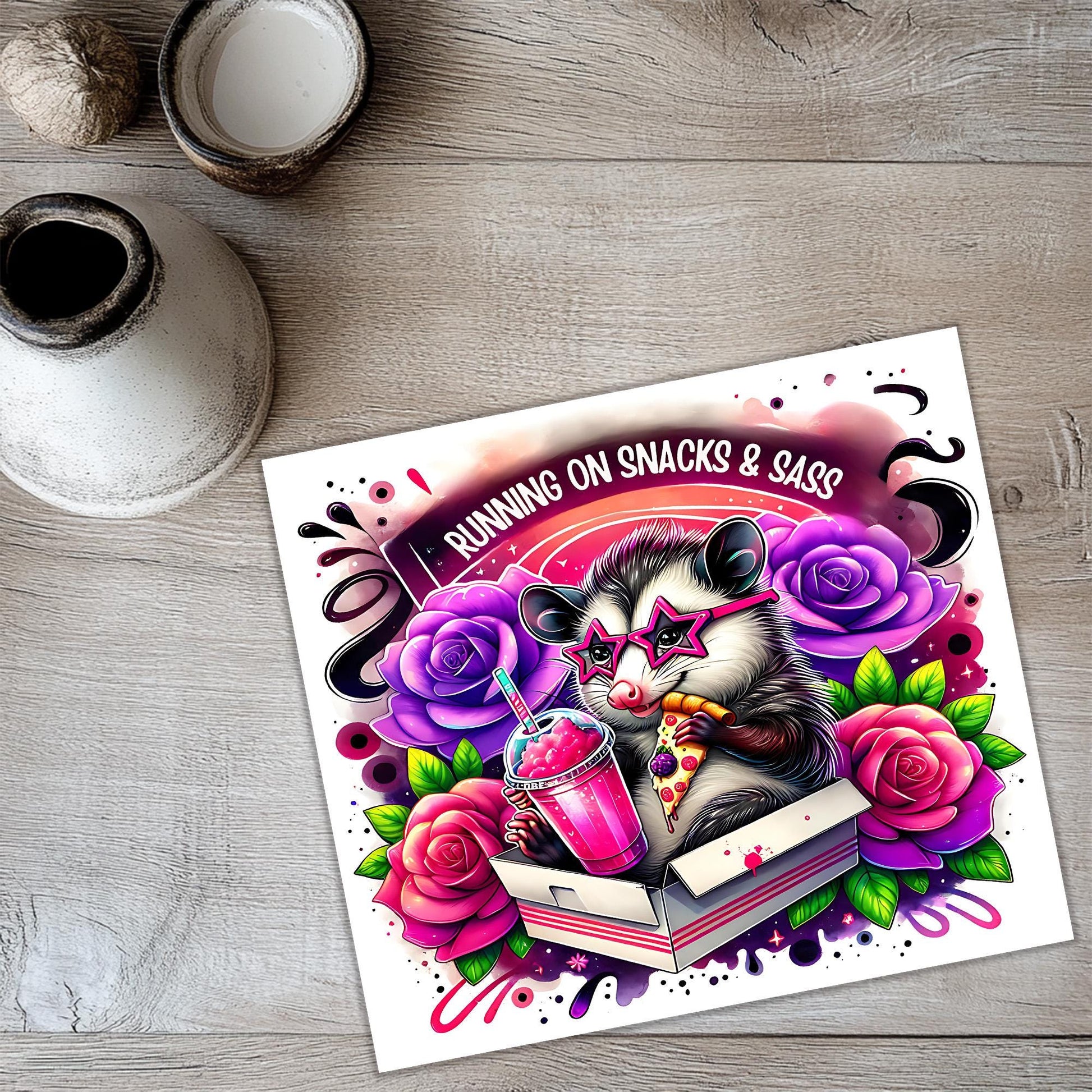 a card with a picture of a raccoon reading a book