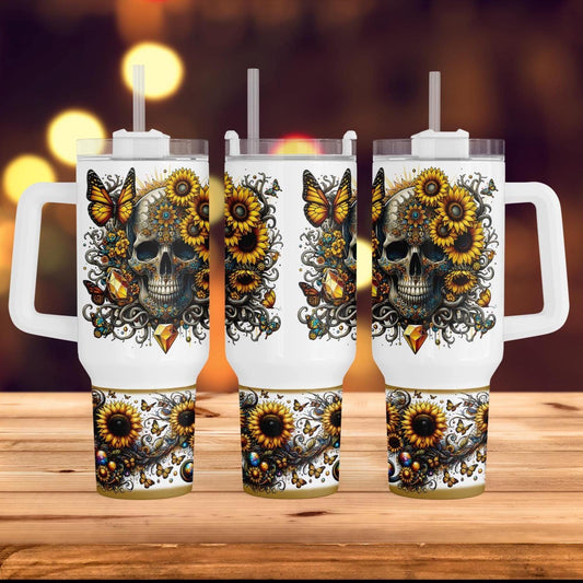 three mugs with sunflowers and a skull on them