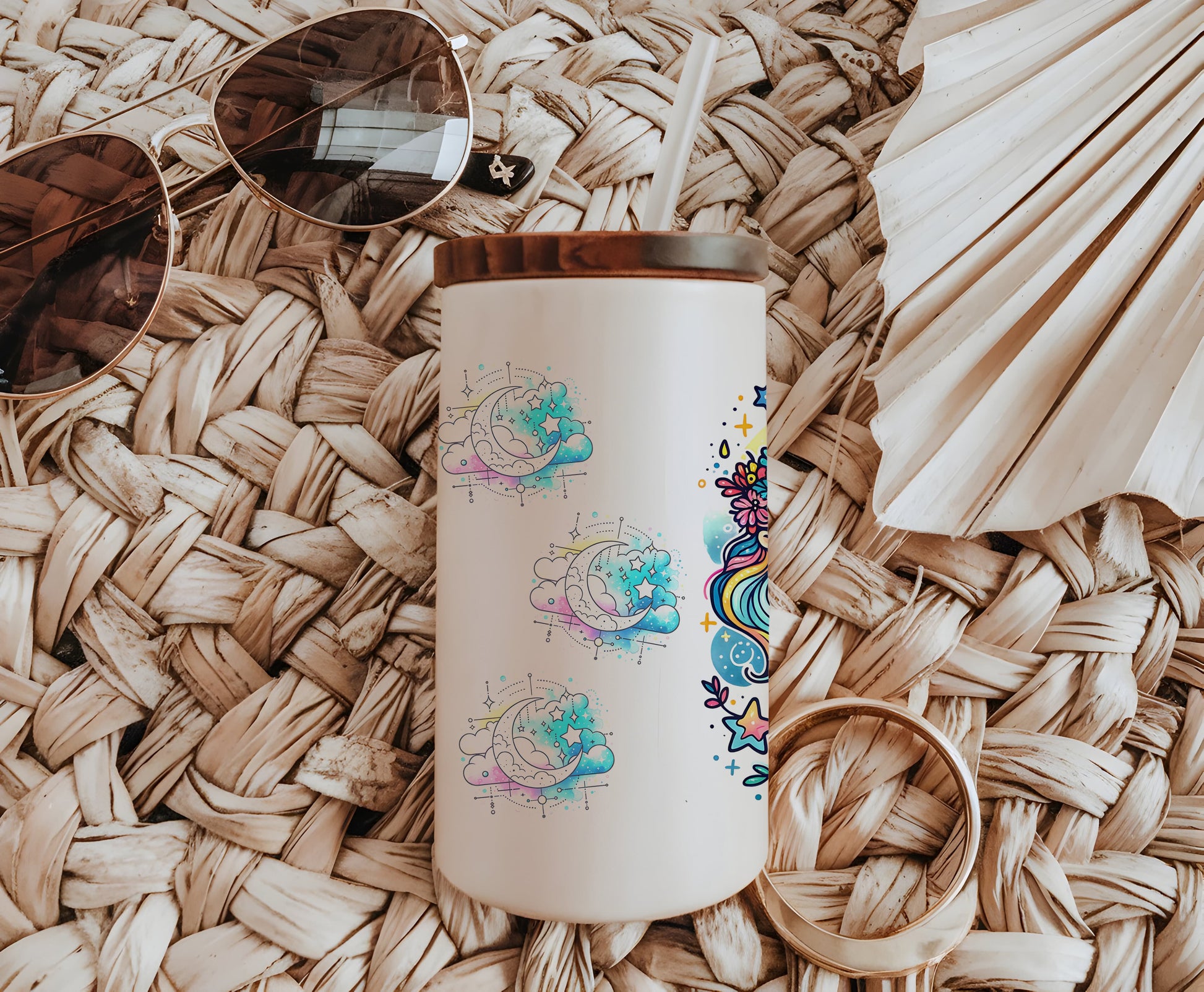 a white coffee cup sitting on top of a wicker table