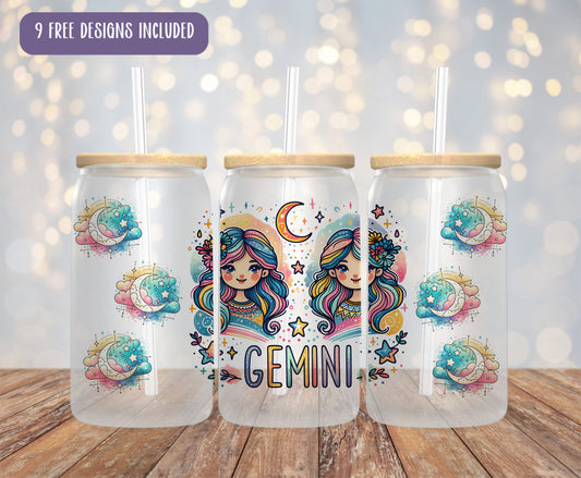 three glass cups with designs on them sitting on a table