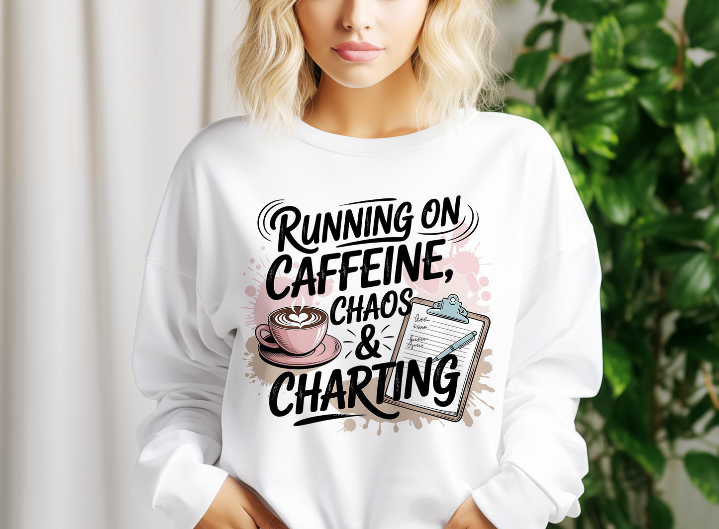A woman wearing a white sweater with a graphic design that says "Running on Caffeine, Chaos & Charting".